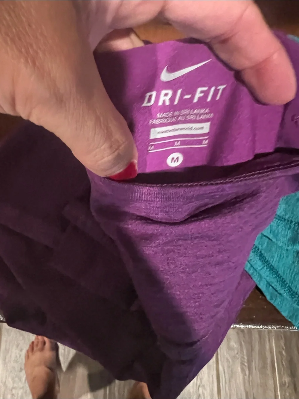 Nike Women’s size Medium Purple and Teal Capri Leggings Duo